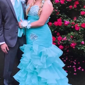 Mint green organza prom dress.